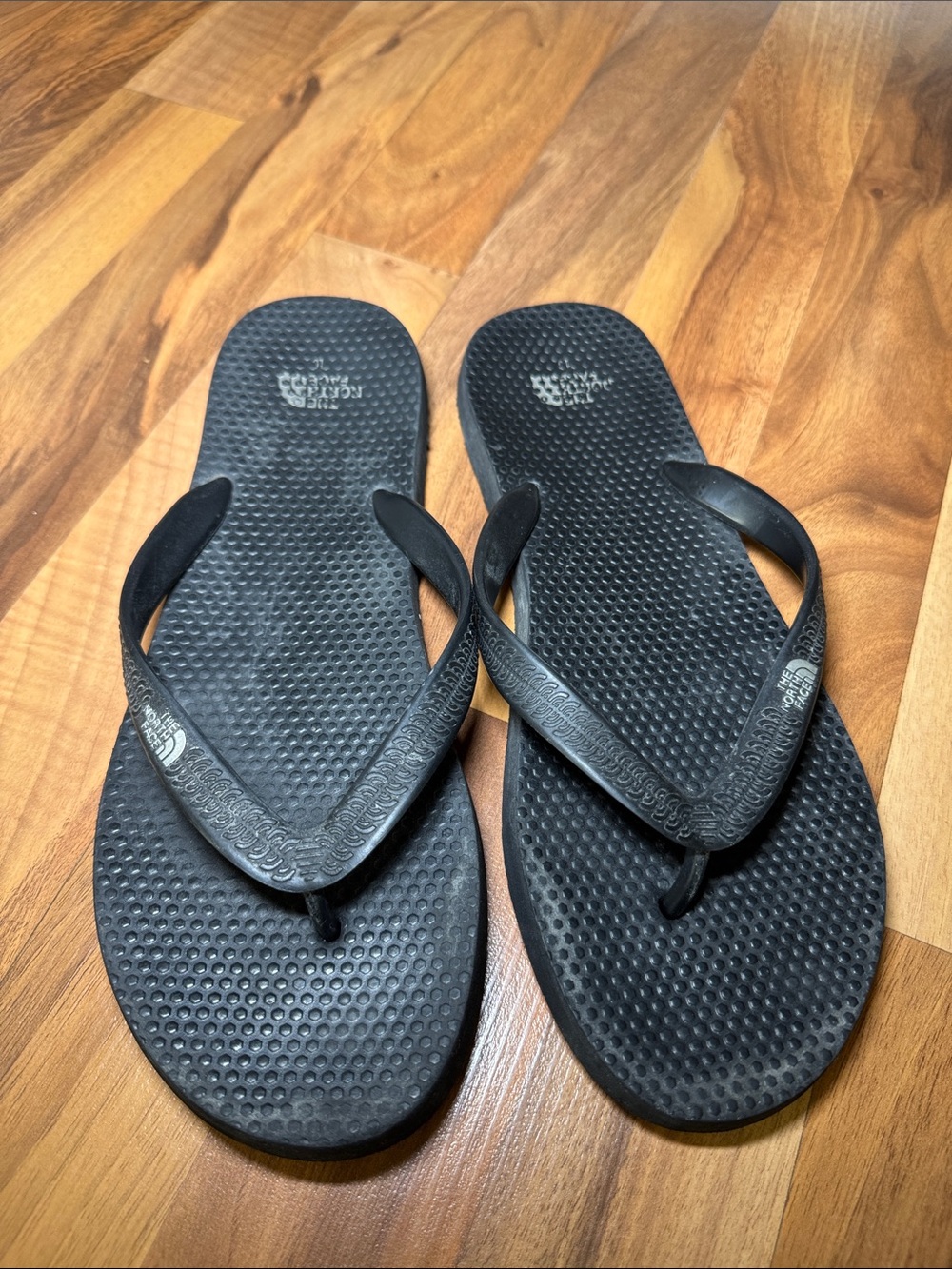 The North Face flip flops in black